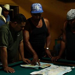 Planning the journey North, Honduras (photo by Marc Silver)