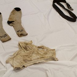 Clothing found on a dead migrant (photo by Marc Silver)