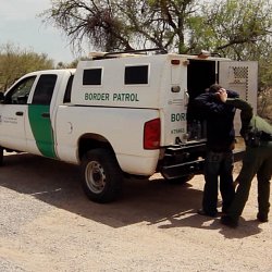 Border Patrol apprehend a migrant who was lost in the desert (photo by Marc Silver)