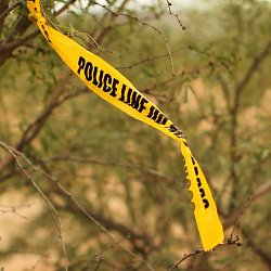 Police tape where a body of a migrant was discovered near Tucson (photo by Marc Silver)